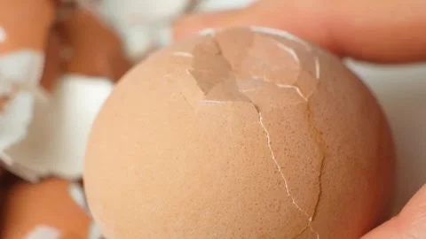 Macro Slow Motion Process Breaking Boiled Egg Shell, Cracks in Shell. Stock Footage 327647293