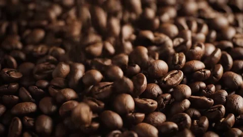 Macro Slow Motion of Roasted Coffee Beans Stock Footage 314805422