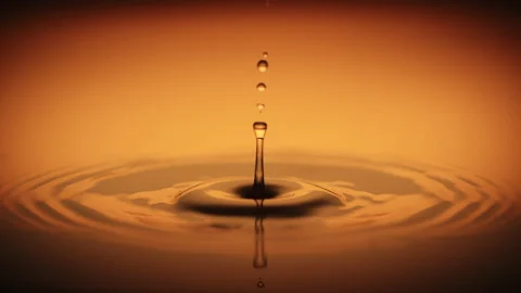 Macro slow motion water drop orange Stock Footage 158439370
