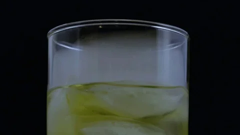 Macro smoke on drink gently blowing Stock Footage 70689317