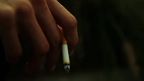 Macro Smoking hipster in Slow-Motion Video stock 89887591