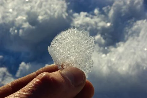 Macro Snow Crystals Held in Hand Stock Photos