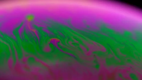 Macro soap bubble creates a colorful and psychedelic background. Rainbow colors Video stock 150565208