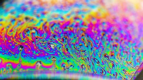 Macro soap bubble creates a colorful and psychedelic background. Rainbow colors Stock-Footage 150565283