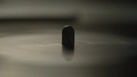 Macro of spinning vinyl record Stock Footage 129588132