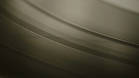 Macro of spinning vinyl record on turntable Stock Footage 129587820