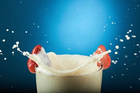 Macro of splash of milk Stock Photos