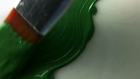 Macro. stains of green paint on a white background Video stock 164169959