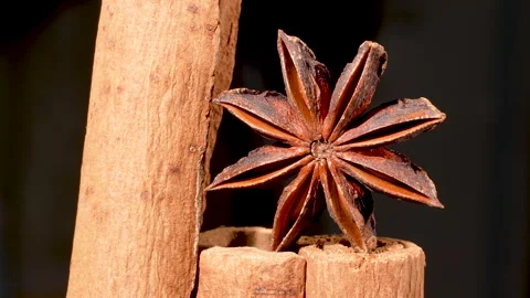 Macro Star Anise And Cinnamon Sticks On Black Background Stockbeeldmateriaal 331377217