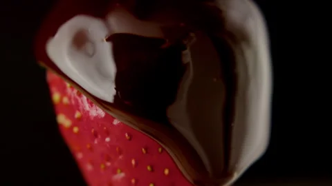 Macro strawberry chocolate drip slow motion liquid cocoa delicious food lust Stock Footage 274304341