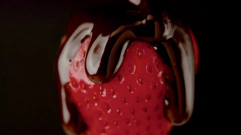 Macro strawberry chocolate drip slow motion liquid cocoa delicious food lust Stock Footage 274304368