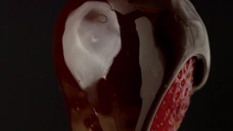 Macro strawberry chocolate drip slow motion liquid cocoa delicious food lust Stock Footage 274304778