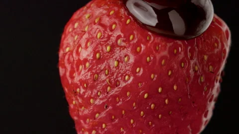 Macro strawberry chocolate drip slow motion liquid cocoa delicious food lust Stock Footage 274304906