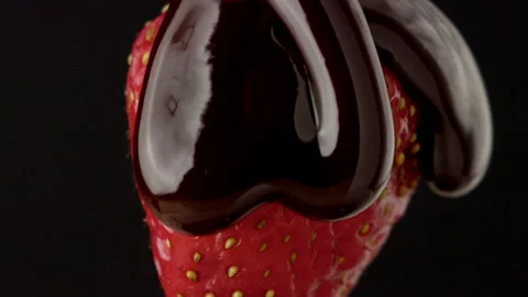 Macro strawberry chocolate drip slow motion liquid cocoa delicious food lust Stock Footage 274304968