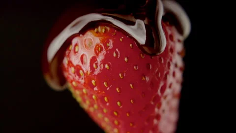 Macro strawberry chocolate drip slow motion liquid cocoa delicious food lust Stock Footage 274306925