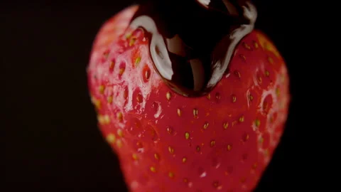 Macro strawberry chocolate drip slow motion liquid cocoa delicious food lust Stock Footage 274306928