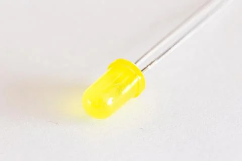 A macro studio portrait of a single yellow colored LED or color Light Emittin Stock Photos