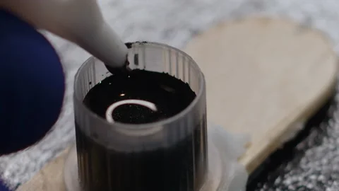 Macro Tattoo Needle Filled With Black Ink Stock Footage 162797951