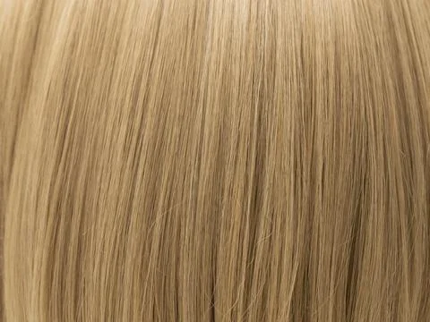 Macro Texture Background of Straight Golden Blonde Hair Strands 写真素材