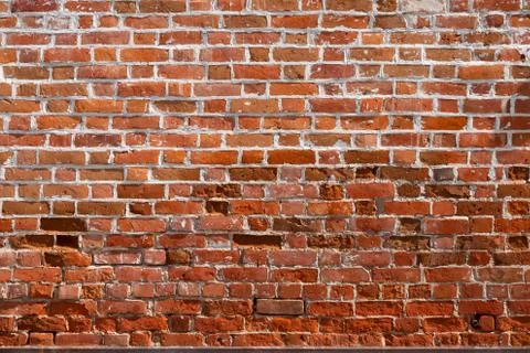 Macro texture of a beautiful red brickwork. Stock Photos