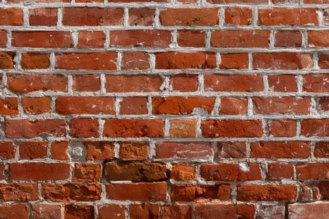 Macro texture of a beautiful red brickwork. Stock Photos
