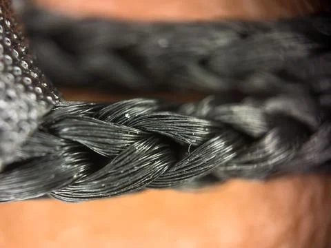 Macro texture of black fabric threads background with selective focus and copy Foto stock
