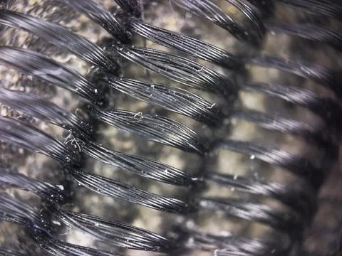 Macro texture of black fabric threads background with selective focus and copy Foto stock