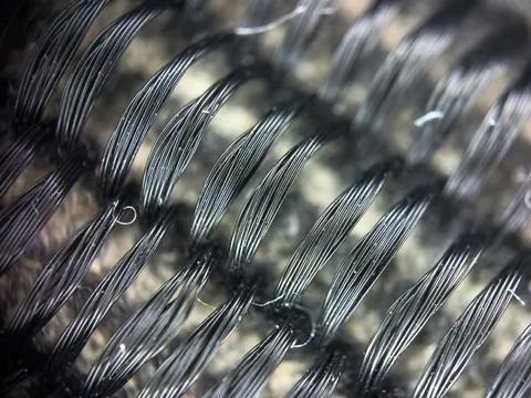 Macro texture of black fabric threads, close up background with selective focus Stock Photos
