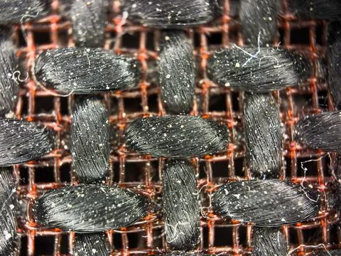 Macro texture of black fabric threads, close up background with selective focus Stock Photos