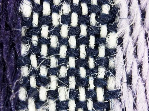 Macro texture of blue and white woven fabric threads background with selective Stock Photos