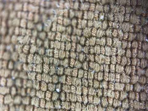 Macro texture of brown fabric threads background with selective focus and copy Foto stock