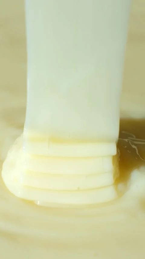 Macro Texture Condensed Milk, Aesthetic Culinary Abstract Vertical Background. Stock Footage 331530168