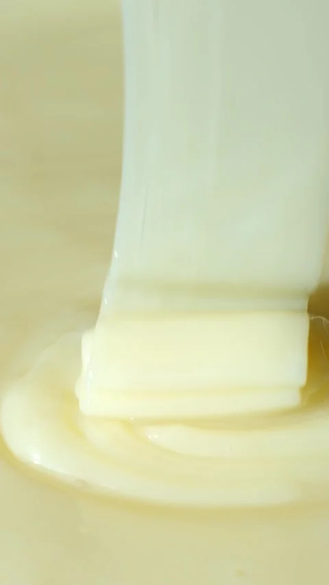 Macro Texture Condensed Milk, Aesthetic Culinary Abstract Vertical Background. Stock Footage 332235114