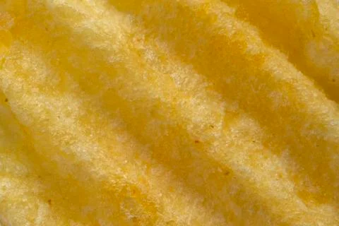 Macro texture of corrugated potato chips Stock-Fotos