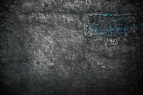 Macro texture of cracked black bitumen rubber waterproofing membrane with a.. Stock Photos