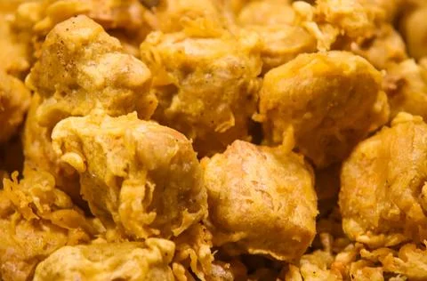 Macro Texture of Crispy Golden Deep Fried Tofu Gorengan Tahu Indonesian Str.. Stock Photos