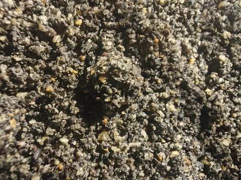 Macro Texture of Dark Granular Soil or Organic Substrate Stock Photos