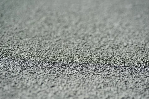 Macro texture details of brick wall roughcast painted grey. Shallow depth of Stock Photos