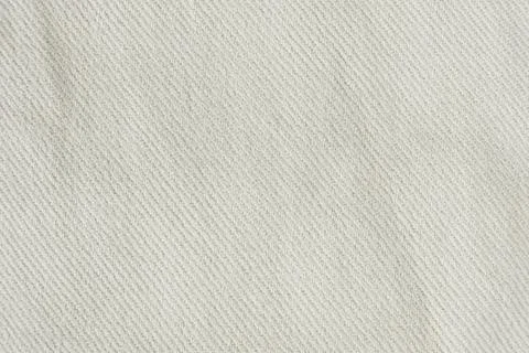 Macro texture of a fabric consisting of one hundred percent cotton. Stock Photos