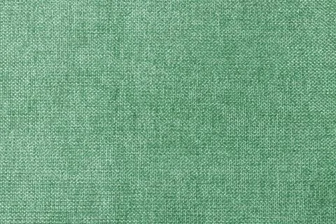 Macro texture fabric of large binding for sewing green background color Fotos de archivo
