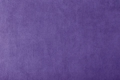 Macro texture fabric of large binding for sewing violet, purple background .. Fotos de archivo