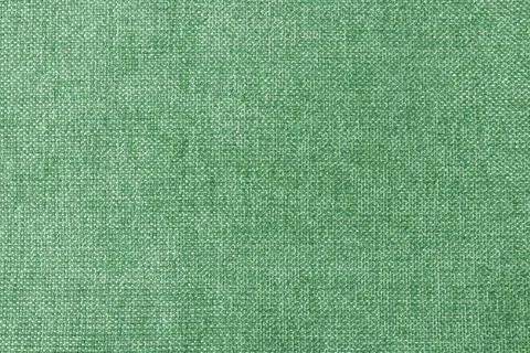 Macro texture fabric of large binding for sewing green background color Fotos de archivo
