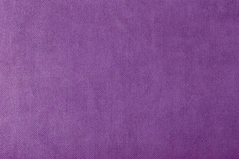 Macro texture fabric of large binding for sewing violet, purple background .. Fotos de archivo