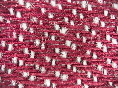 Macro texture of fabric threads background with selective focus and copy space Stock Photos