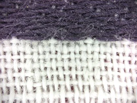 Macro texture of fabric threads background with selective focus and copy space Stock Photos