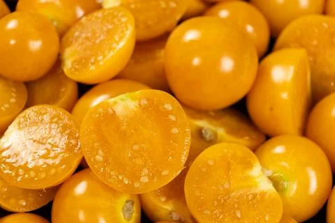 Macro texture of fresh golden berries physalis showing inner seeds and juicy  Stock Photos
