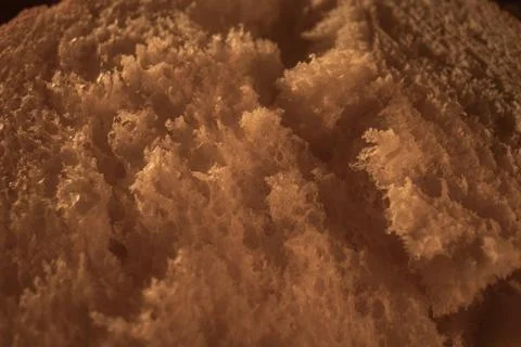 Macro texture of fresh white bread crumb porous structure Stock Photos