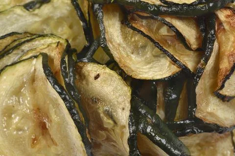 Macro Texture of Fried Zucchini Slices Stock-Fotos