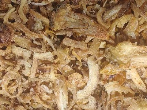 Macro Texture of Golden Crispy Fried Shallots Stock Photos