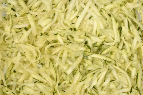 Macro Texture of Grated Raw Zucchini Stock Photos